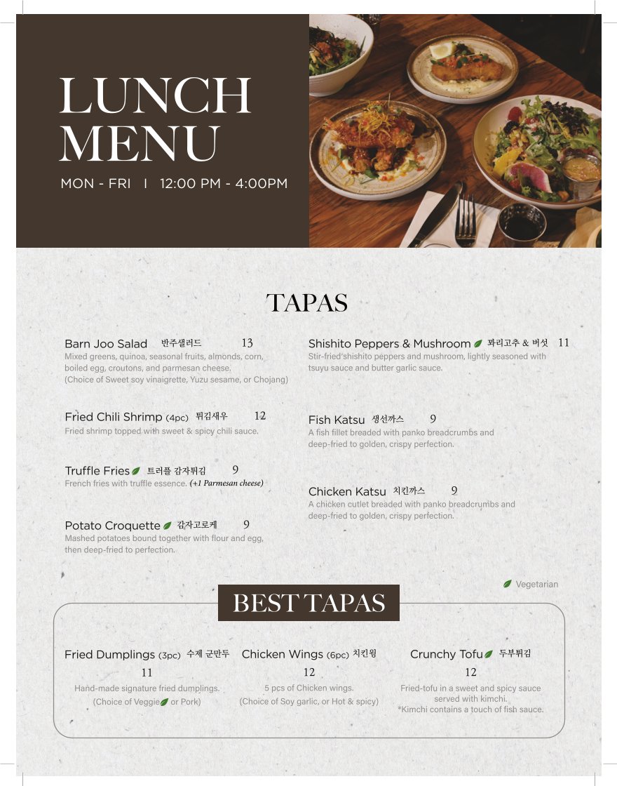 Menu page beside a drink glass.
