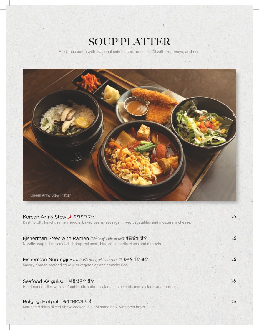Restaurant menu laid flat on a table.